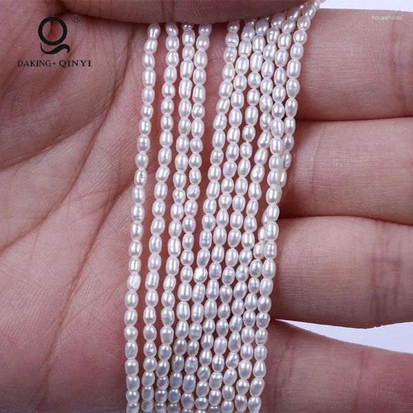 Las piedras preciosas sueltas venden al por mayor el hilo de perlas reales de agua dulce con forma de arroz AA de 2-3 mm para joyería