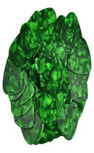 Veel 100 stuks medium 071 mm plectrums plectrums celluloid parelgroen voor akoestische gitaar4178085