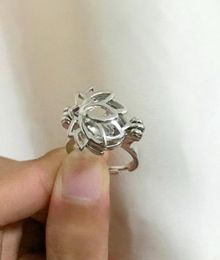 La bague de cage de forme de lotus peut s'ouvrir