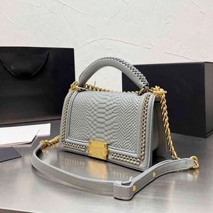 Louls Vutt Ladies Fap Mini Sacs de créateurs à bandoulière Couleur solide en cuir authentique Classic Handbags Gold-Tone Metal Chains Snake Patter Po Osqo