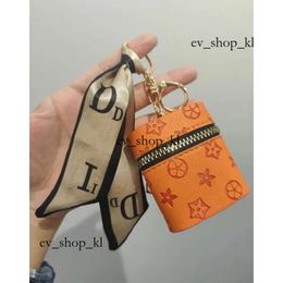 Lousis vouton sac Keychain Créativité Presbyopie Coin Purse Pendante Charme Jielch Fashion Pu Leather Flower Grid 69 LouiseviUtionbag Keledchain