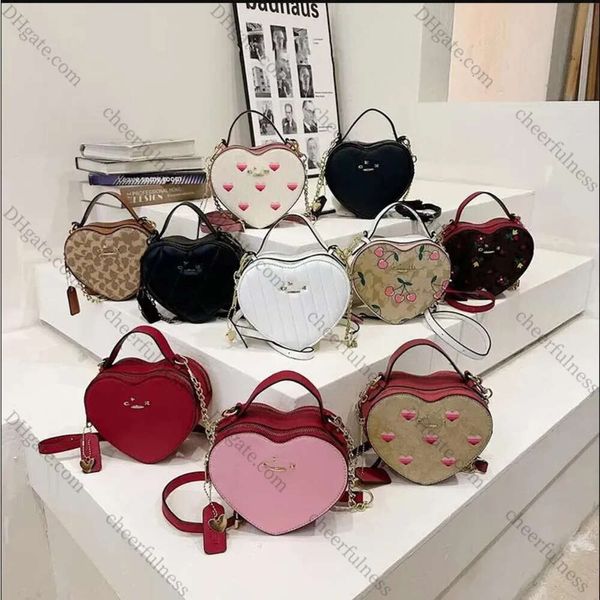 Bolsos de diseñador de amor Bolso para mujer Luxe Bolsos de hombro clásicos Bolso de mano Bolso de mano Totes Mochila de moda Flor vieja Bolsas cruzadas para el cuerpo Linda cereza Corazón Raya