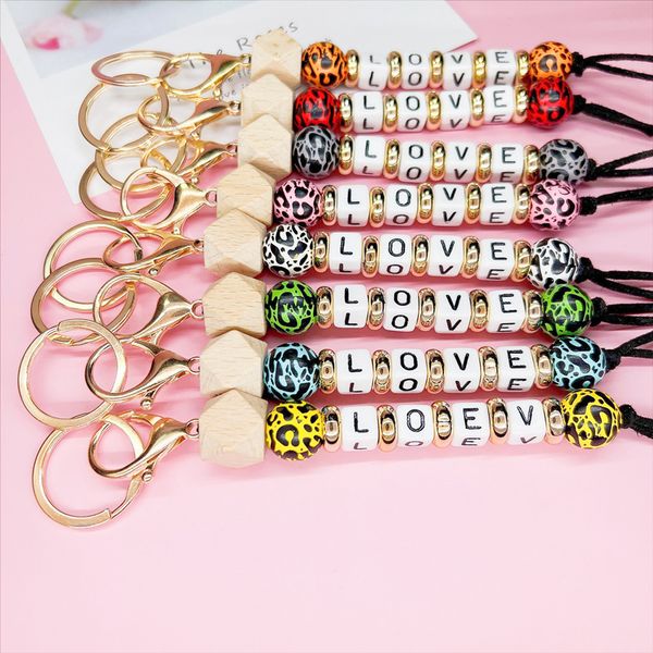 LOVE lettre porte-clés en bois léopard couple porte-clés pendentif imprimé léopard perle sac pendentif JW162