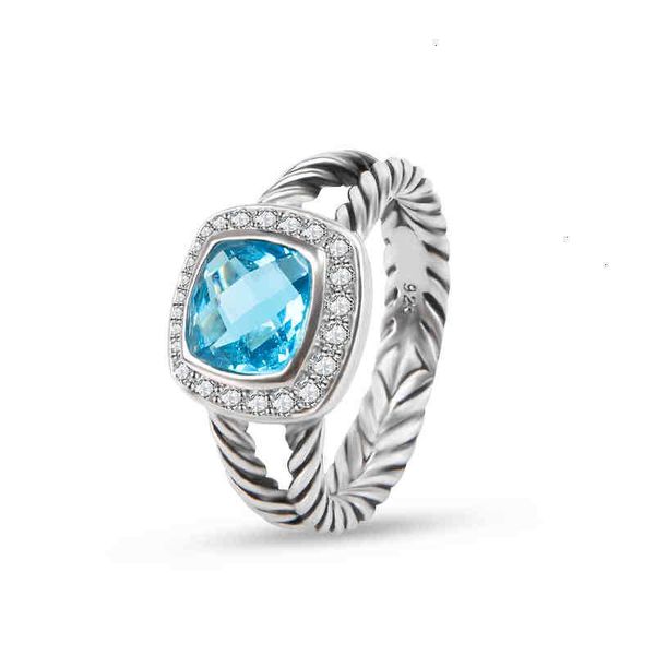 Love Women Diseñadores Anillos de boda clásicos Anillo de joyas Gold Twisted Cz Diseñador Blue Topaz Zircon Hoop Fashion Gifts