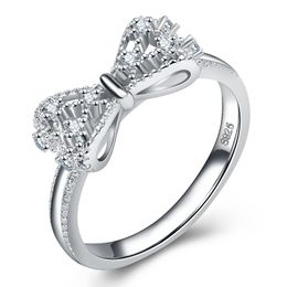 Anillos encantadores de la banda del diseño del Bowknot para las mujeres las muchachas aman la joyería linda del anillo del arco del diamante del cristal brillante