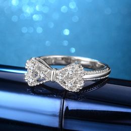 Anillos encantadores de la banda del diseño del Bowknot para las mujeres las muchachas aman la joyería linda del partido del anillo del arco del diamante del cristal brillante