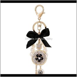 Joli nœud mignon perle fleur bouteille de parfum mode Ins luxe concepteur diamant strass sac charmes gland 8Zlh6 Nen2Y