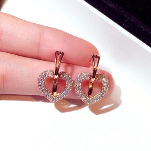 Encantadores aretes de clip de corazón con flor de circón y diamantes para mujer y niña, diseñador de lujo de moda súper brillante