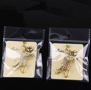 Broche de León con forma de Animal en tono dorado para hombre, alfileres de solapa con ramillete de diamantes de imitación de cristal transparente, accesorio para camisa, joyería de moda