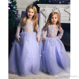 Encantadora niña de flores lavanda Dreses Mangas de boda para niños Niños para niños.