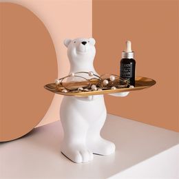 Belle plate d'organisateur de l'ours polaire, serveur décoratif de la figurine montre un plat de service au quotidien