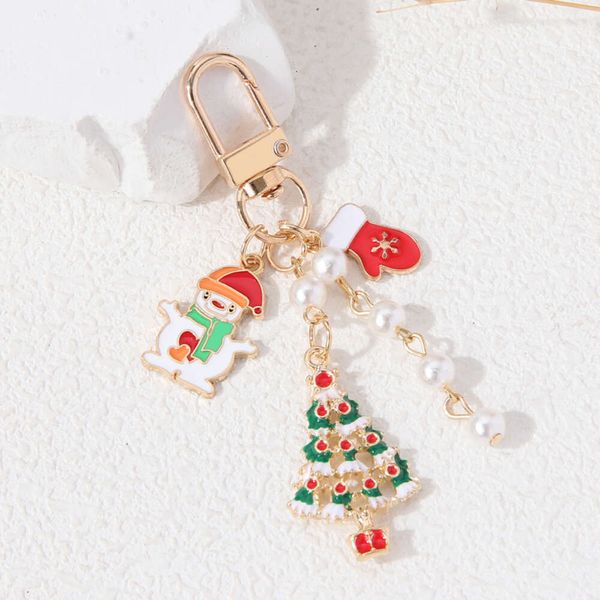 Encantador árbol de muñeco de nieve presente Keychains de Navidad Santa Claus Penguin Anillos clave para mujeres Men Feiedship Jewellry