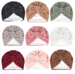 Lovely Warm Bowknot diadema invierno Baby beanie hat Color sólido infantil Beanies Head Wraps Lindo suave vellón Grueso Kids Turban Baby Headbands
