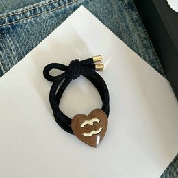 Loves Heart Hair Ties Accessoires de mode Femmes Designer Jewelry Band Rubber Nettail Coil Corde Elastic Scrunchies