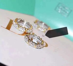 Laaggeprijsde Koreaanse sieraden met gegraveerd 18k goud titanium staal voor heren en dames nieuwe T-familie elektrische ring