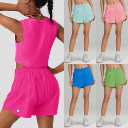 LU-565 Femmes Tenues de yoga décontractées avec de l'exercice Fiess porte des filles courtes coulant les poches de vêtements de sport élastiques shorts de piste