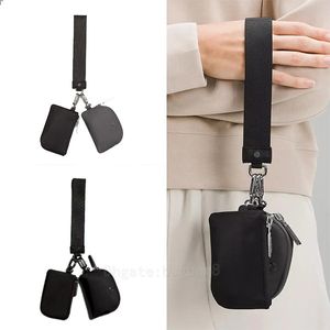 LU Cartera de diseñador en todas partes NUEVA Moda Bolsa doble vender bien bolsa de muñeca almacenamiento monedas bolsas de llaves Bolso de embrague Bolsos de palma de nailon de lujo Deportes yoga mujeres hombres Deporte al aire libre