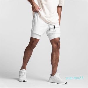 lu Pantalones cortos de fitness para hombre, de doble capa, deportivos, para correr, invisibles, con asiento abierto, pantalones sexuales, pantalones de secado rápido, pantalones cortos de encaje con múltiples bolsillos de 5 puntos