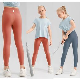 Lu Girls Yoga Bra Leggings Kids Sets Llthin Colt Papant Pantalon Soft Elastic Sports Pantalons serrés Enfants dansant Pantalon Skinny