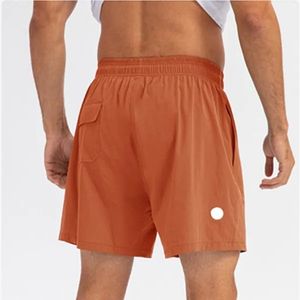 Lu Lemons Men Yoga Sports Shorts secs et sèches rapides avec un téléphone mobile de poche arrière Casual Runnul Lulmenly Gym Jogger Pant