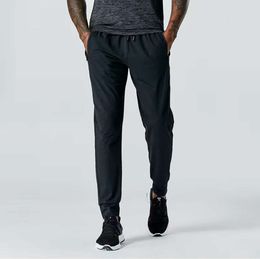 LU LU L Jogger Pantalones largos Deporte Traje de yoga Al aire libre Ciudad-Sudor Yogo Gimnasio Bolsillos LL Pantalones de chándal Pantalones Casual para hombre Cintura elástica fitness Ropa de tendencia de moda