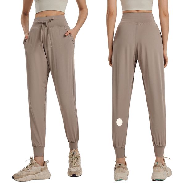 LU LU Mujeres Jogging Yoga Noveno Pantalones Bolsillo Fitness Leggings Suave Cintura Alta Levantamiento De Cadera Elástico Pantalones Casuales Piernas Con Cordón Pantalones De Chándal LULEMON