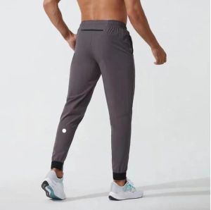 LU Femmes LL Hommes Jogger Pantalons Longs Sport Yoga Tenue Séchage Rapide Cordon De Gym Poches Pantalons De Survêtement Pantalons Casual Taille Élastique fitness8S