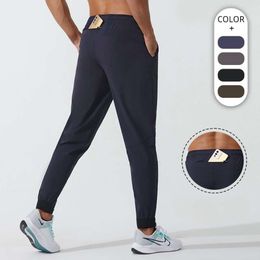 LU Dames Heren Jogger Lange Broek Sport Yoga Outfit Sneldrogend Trekkoord Gym Zakken Joggingbroek Broek Heren Casual Elastische taille Fiess