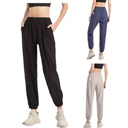 Lu Yoga tenue femmes Jogging neuvième poche Fitness Leggings doux taille haute hanche ascenseur élastique pantalon décontracté