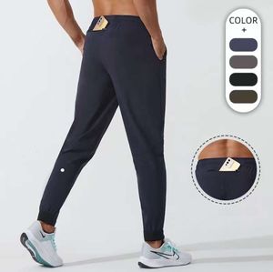 LU Pantalones de yoga para hombre y mujer LL Jogger Traje deportivo largo Cordón de secado rápido Gimnasio Pantalones deportivos con bolsillo Pantalones Casual Cintura elástica fitness