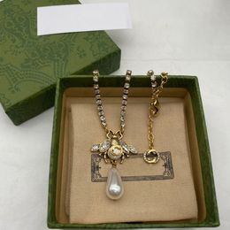 Collier avec pendentif en perles d'abeille porte-bonheur pour femmes, charme unique exclusif