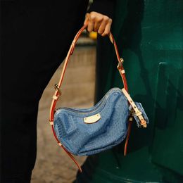 Luis Vuittons LOOP LVSE LouiseviUeution Puisseau Sacs de pois Hobo Denim Vintage Luxurys Designer Sacs Sacs à main doux sacs à main