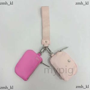 Lulemon ontwerper yoga tas dubbele zak roze sleutelhanger mini afneembare mini zip rond portemonnee draagbare portemonnee munt portemonnee mini munt pocket lulumon sleutelhanger 702