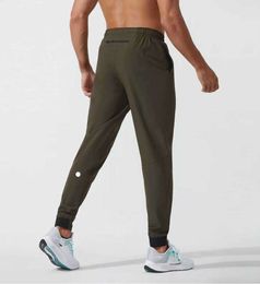 Lululemen man Lulu pantalones cortos Traje de yoga Jogger Deporte Cordón de secado rápido Bolsillos de gimnasio Pantalones de chándal Pantalones para hombre Casual Cintura elástica Fitness 451