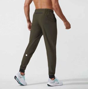 Lululemen homme Lulu pantalon court tenue de yoga survêtement sport séchage rapide cordon de serrage poches de sport pantalons de survêtement pantalon décontracté taille élastique fitness all-match