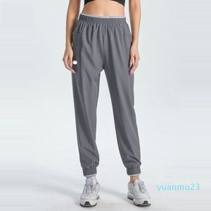 lululemenly Femmes Jogging Yoga Neuvième Pantalon Grande Poche Fitness Doux Taille Haute Jogger Pantalons Décontractés Cordon Jambes Pantalons De Survêtement Couleurs Claires Pour L'été