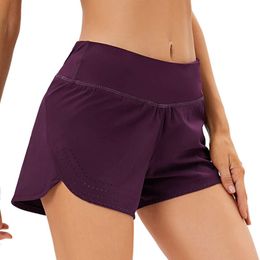 Lulumon shorts anti-regard sportif shorts féminins Loose doublure pour courir dans le gymnase et porter un pantalon de yoga à cordon avec des poches