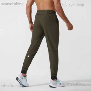 Lulus Man Lulu Pantalon court Tenue de yoga Jogger Sport Séchage rapide Cordon de serrage Poches de sport Pantalon de survêtement Pantalon décontracté Taille élastique Fitness lululemen womens