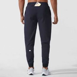 lulus Hombres Jogger Pantalones largos Sport Yoga Outfit Quick Dry Cordón Gimnasio Bolsillos Pantalones de chándal Pantalones Hombre Casual Cintura elástica movimiento de fitness