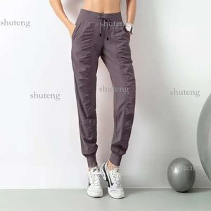 Lulus Femmes Yogas Studio Pantalon Dames Séchage Rapide Cordon De Course Pantalon De Sport Lâche Danse Survêtement Filles Gym Fitness Lululemens 661ess 198 rr