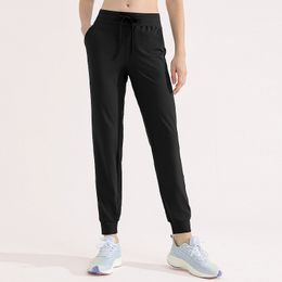 Luluwomen avec logo Yoga Pantalon de survêtement ample à séchage rapide Pantalon de fitness pour femme Taille haute Pantalon de yoga respirant pour soulever les fesses