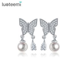 Lutoteemi Nouvelles femmes de haute qualité belles dames imitation de perle papillon conception argenté plates d'oreille goujons d'oreilles bijoux de fête1724957