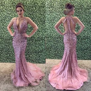 Luxrious Rhinestone Mermaid Prom Dress Diepe V-hals Pailletten Krème Crystal Cutaway Partyjurken Sexy Mode Avondjurk Dubai Jurken
