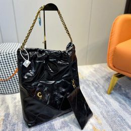 Concepteurs de luxe des sacs de sacs de sacs diamant motif en or saclet de chaîne métallique sac à dos concepteur joyeuse sacs poubelle 2022236w