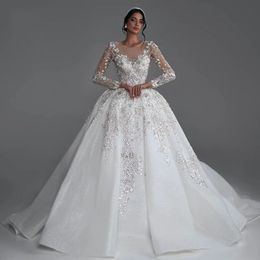 Luxueuse 2024 robes de mariée à balle arabe plus taille de taille en arrière sans dos de manches longues en arrière robes de mariée époustouflantes robes mariées à paillettes personnaliser