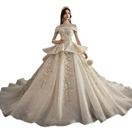 Robes de mariée luxueuses robe de bal hors épaule manches longues perles appliques dentelle robe de mariée sur mesure dos nu balayage train mariée