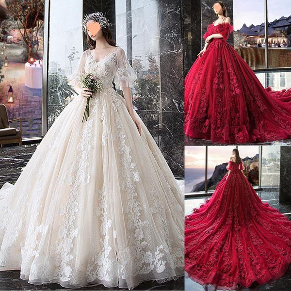 Robes de mariée luxueuses robe de bal manches courtes tulle avec fleurs florales 3D demandeur dos nu tache chapelle tribunal train sur mesure robes De Novia