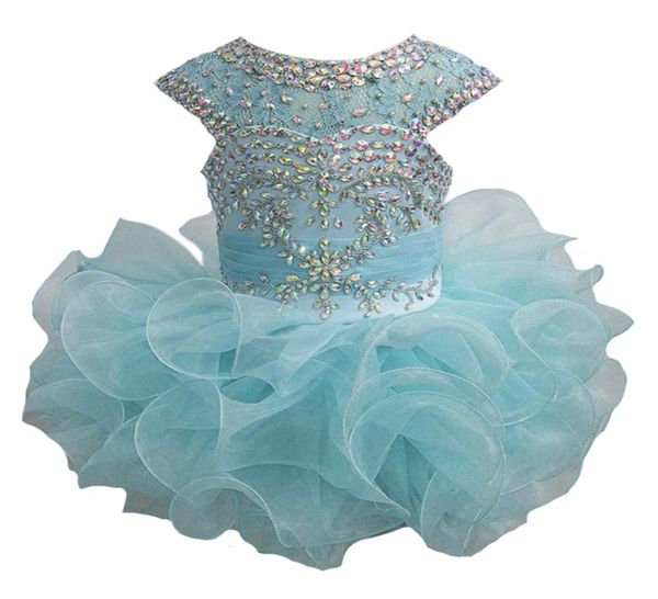 Luxueux nouvelles petites filles Glitz perlé Pageant Cupcake robes infantile Mini jupes courtes enfant en bas âge Tutu fille volants robes 20207796153
