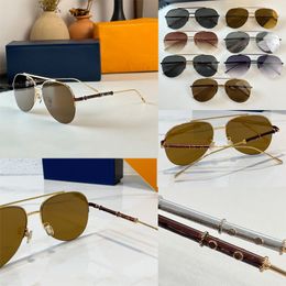 Luxe 1.1 ovale metalen frame Z2024E mode heren- en damesspiegelpoten en -poten met gegraveerde bloemsignatuur gradiëntbril voor vrije tijd, vakanties en feesten