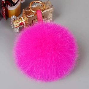 Luxe 13 cm pluizige echte Fox Fur Ball Pom Poms Fur Pompom Hoogwaardige sleutelhanger Key Chain Metal Ring Pendant voor vrouwen 240424